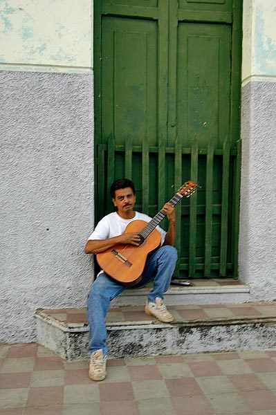 Playing guitar in the afternoon.