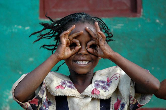 I had this cute girl pose for me in Konso.  In this photo she's showing the local sign for 
