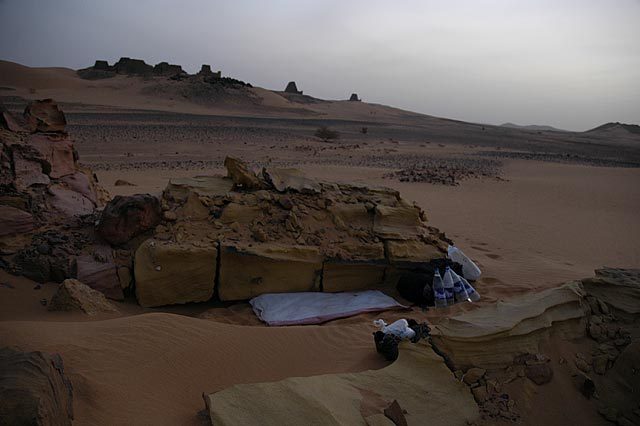 Sleeping in the sand beside the pyramids