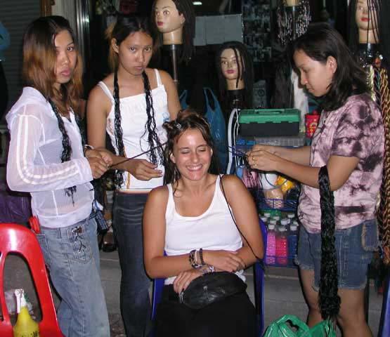 Every backpacker buys a pair of fisherman's pants and gets their hair braided (or dreaded) before going to Pai.