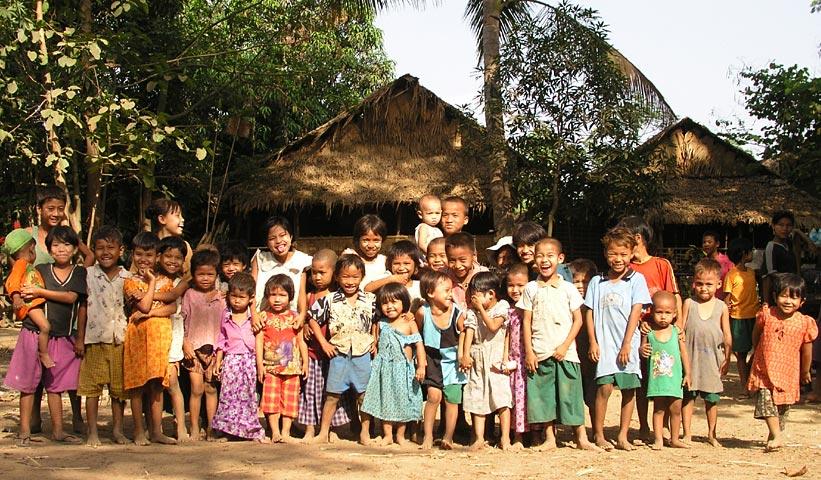 Everywhere you go in Myanmar kids gather to see you.  In Bago, I asked them to line up for a photo.  All 33 kids have fun facial expressions.  Which is your favorite?