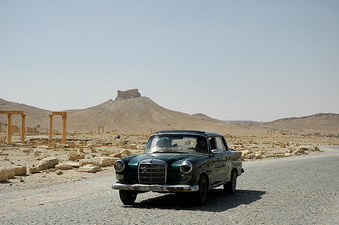 The typical desert car - an old beat-up mercedes.