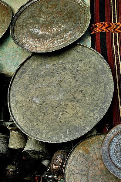 A Christian vendor explained that traditionally the Christians made the fabric, the muslims did the inlay work and the Jews made the metalwork.  Later I found this large brass platter with Jewish stars. The 3000 year old Jewish community of Aleppo is now down to only a couple dozen Jews.
