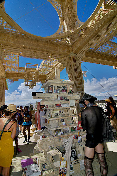 The temple acts as a real temple, and people leave thoughts and memories of people who have passed away.  All of it is burned at the end of the week.