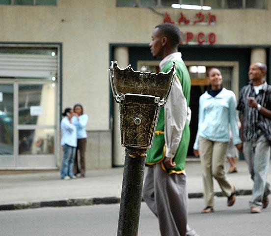 There are few working parking meters in Addis Ababa.  Mostly human parking monitors (the guy in the green uniform) run after cars as they're leaving, to collect the money.