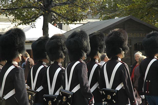 The changing of the guard marching away from the Royal Palace in Copenhagen.
