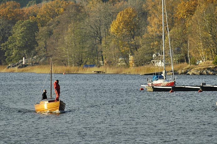 Boaters on the lake in Gustavsberg.  One of the many, many lakes in Sweden.