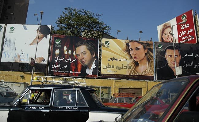 Downtown Cairo - traffic jams and high-fashion billboards.