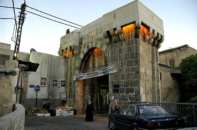 One of the ancient gates to the city.  If you look closely you can see all of the 'big brother' like photos of President Bashar al-Assad.  I count at least 9 of them.