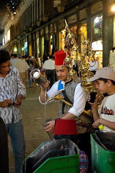 Tea vendor selling tea in the Damascus Souk.