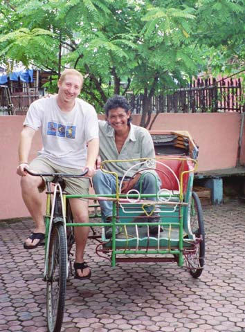 Driving around a pedicab.