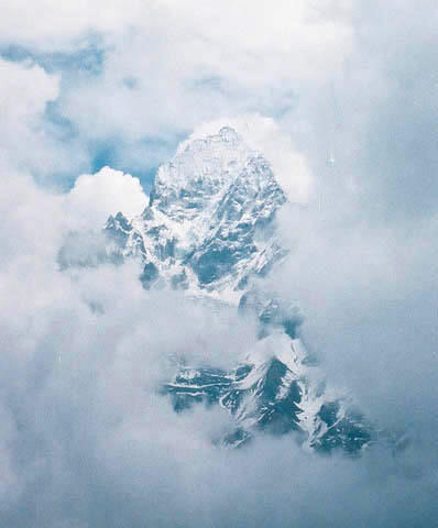 This is a view from Namche Bazaar. I looked up and where there should have been sky instead the clouds parted and showed the mountains surrounding the town.
