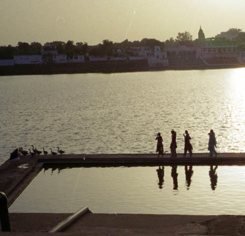 Each day all the tourists in town gather by the side of the lake and watch the sunset.  